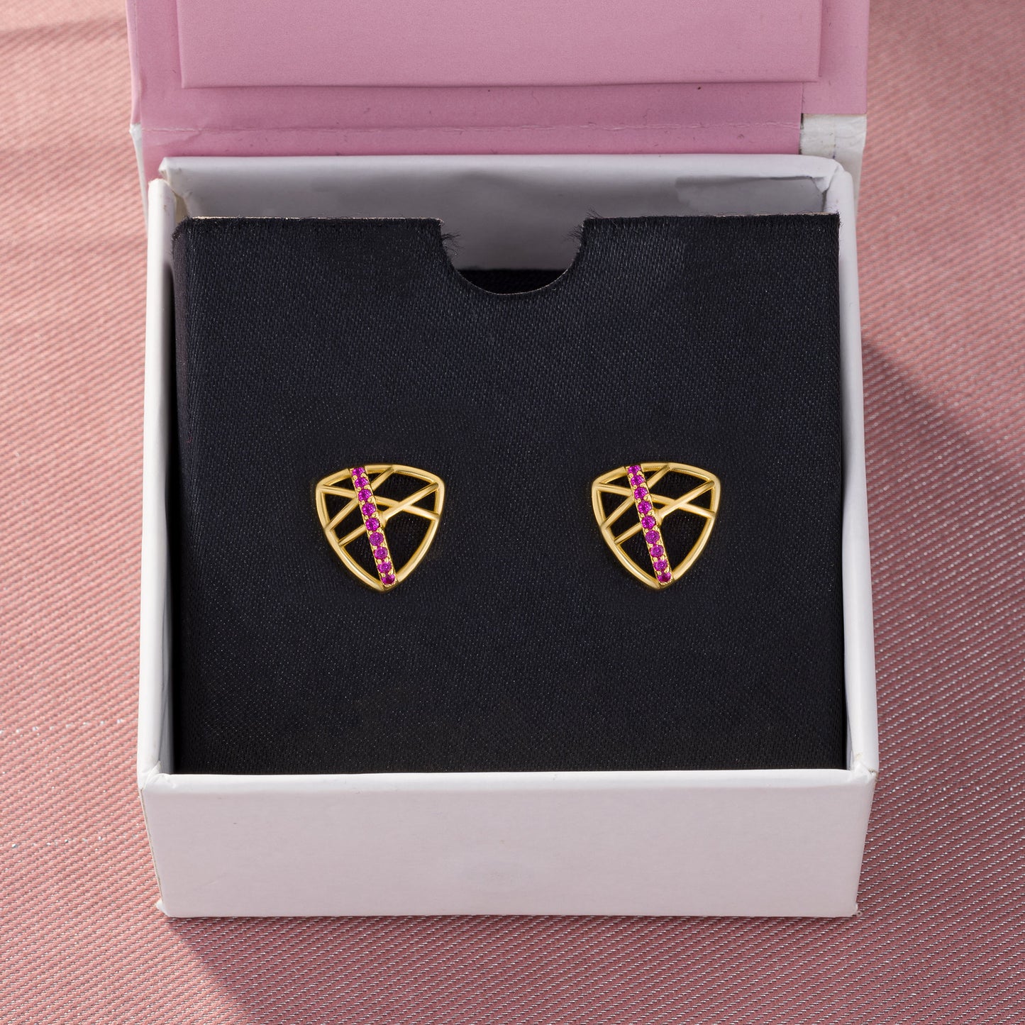 golden and pink stud earrings