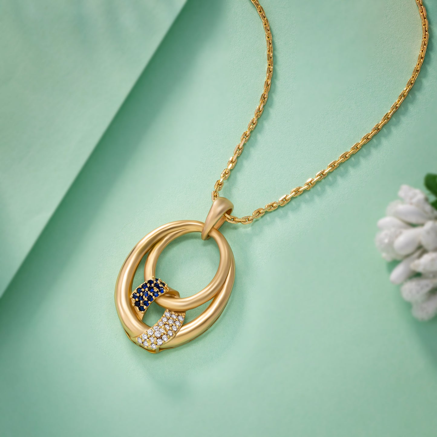 eegance of this exquisite golden pendant