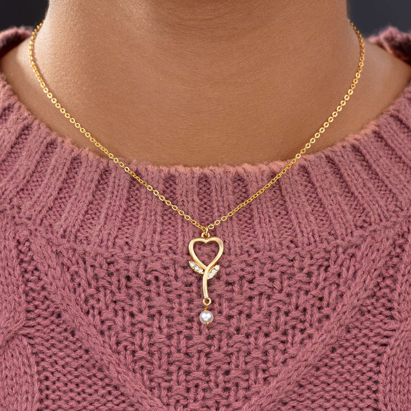 golden necklace with  diamond heart pendant