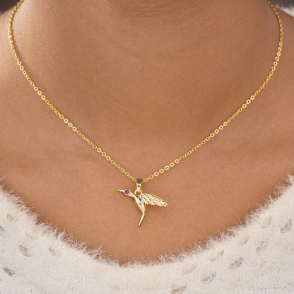 Golden Bird Necklace with a Diamond on the Front