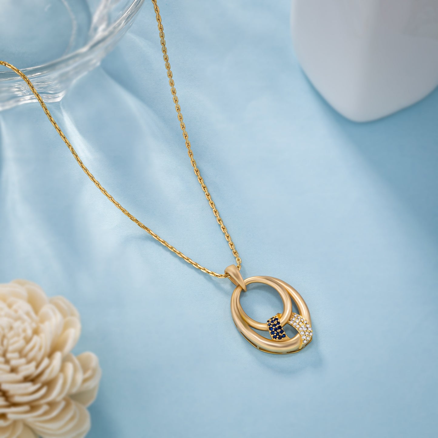 eegance of this exquisite blue golden pendant