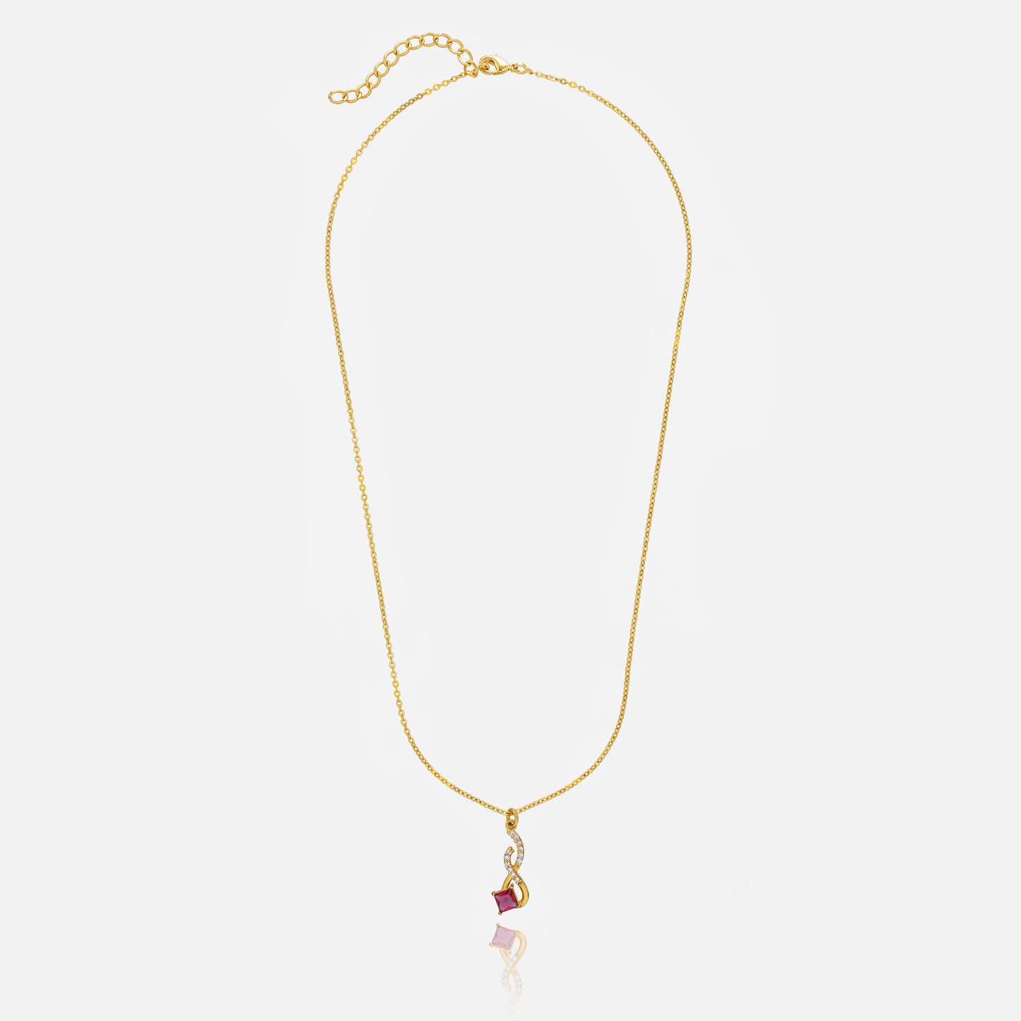 golden necklace with a red stone pendant