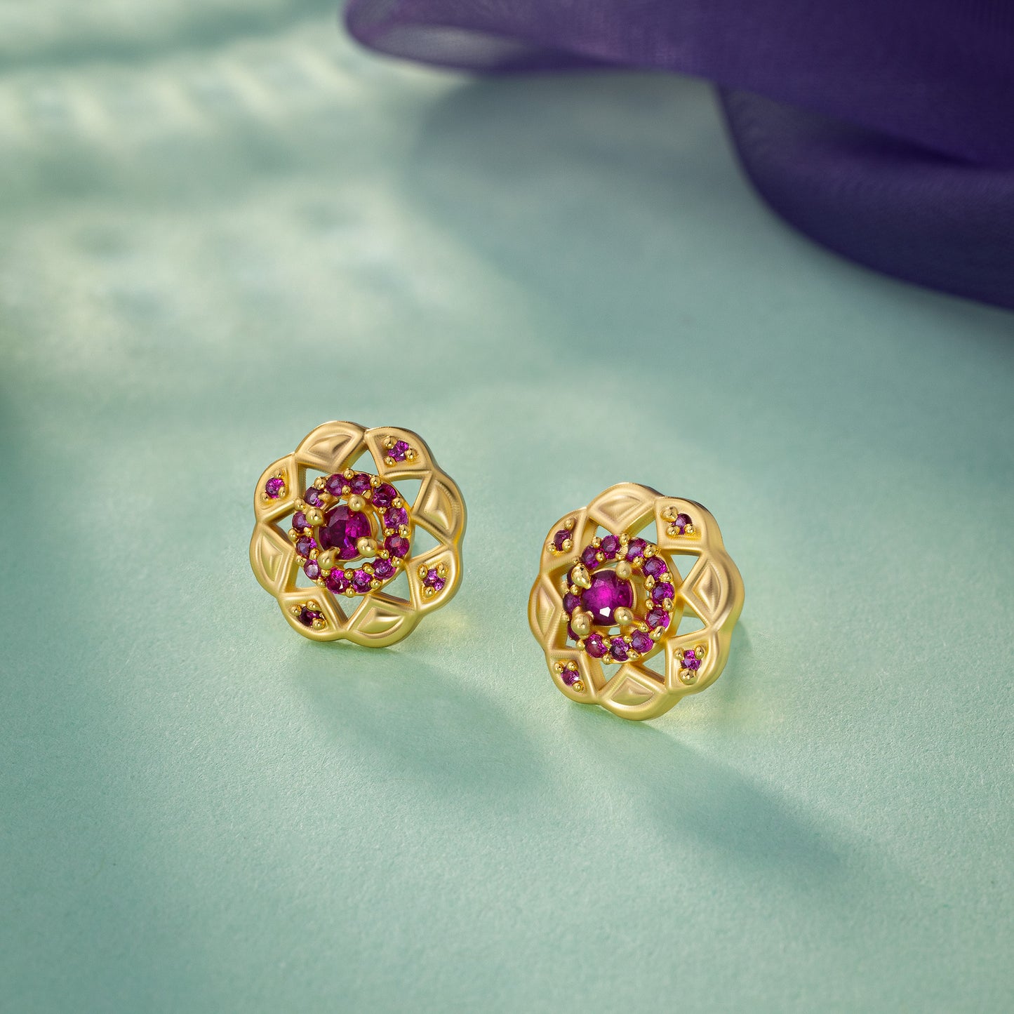 red radiant lotus studs