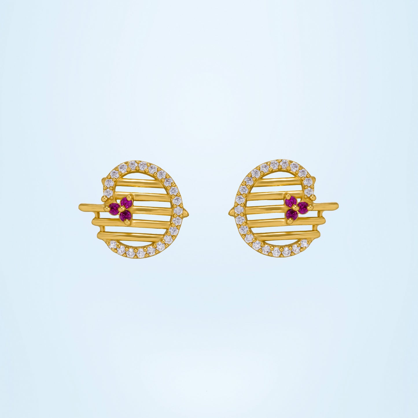 pair of golden earrings with ruby and diamonds