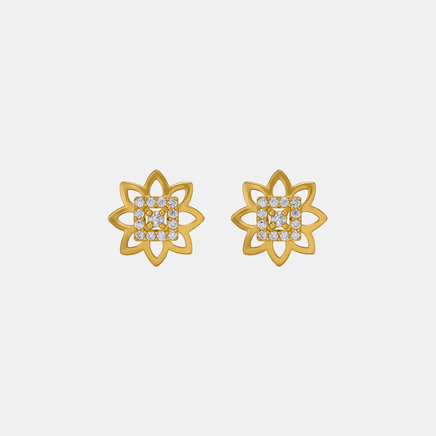 pair of golden earrings with diamonds