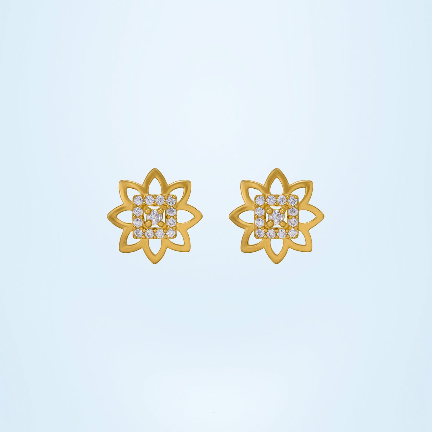 pair of golden earrings with diamonds