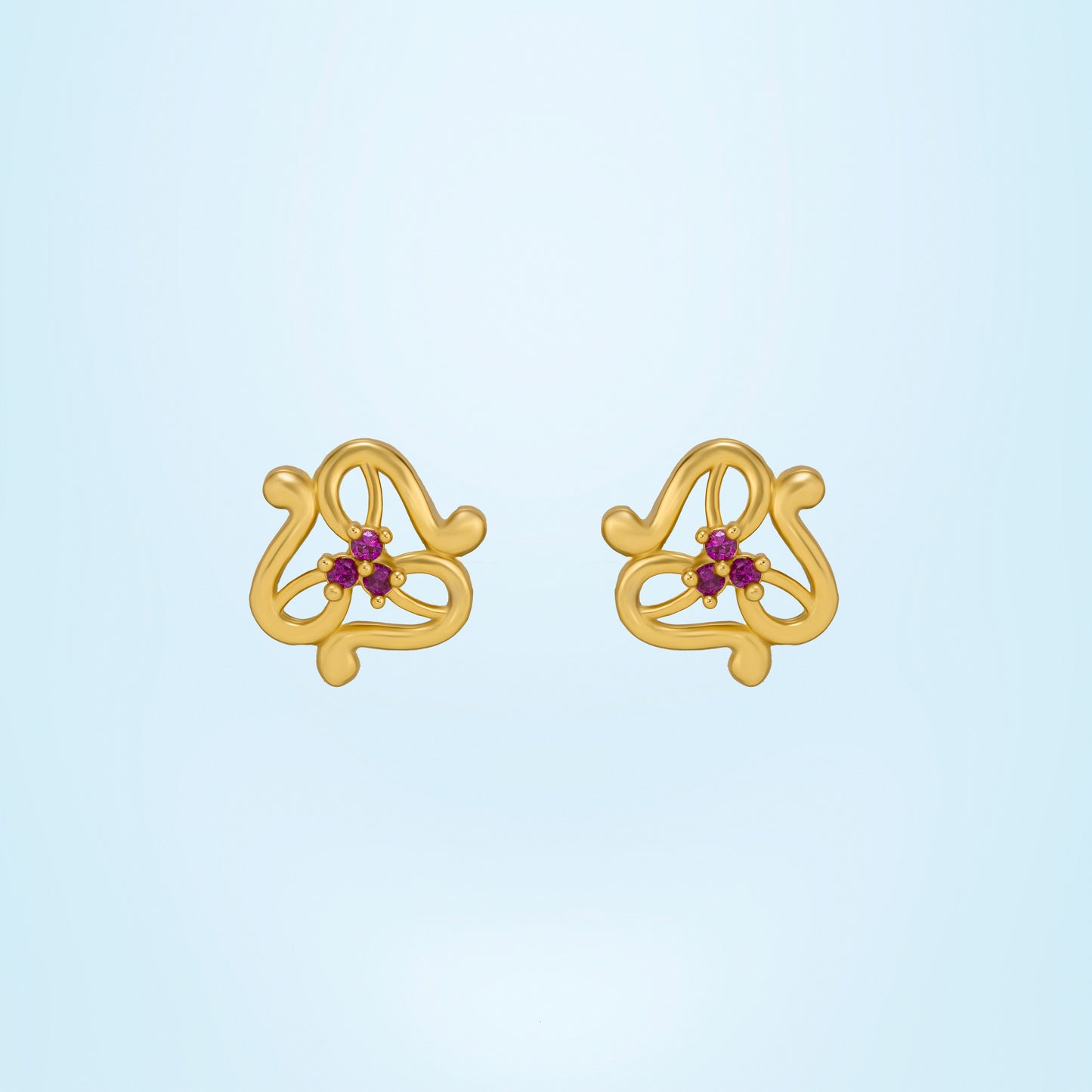 pair of golden earrings with stones