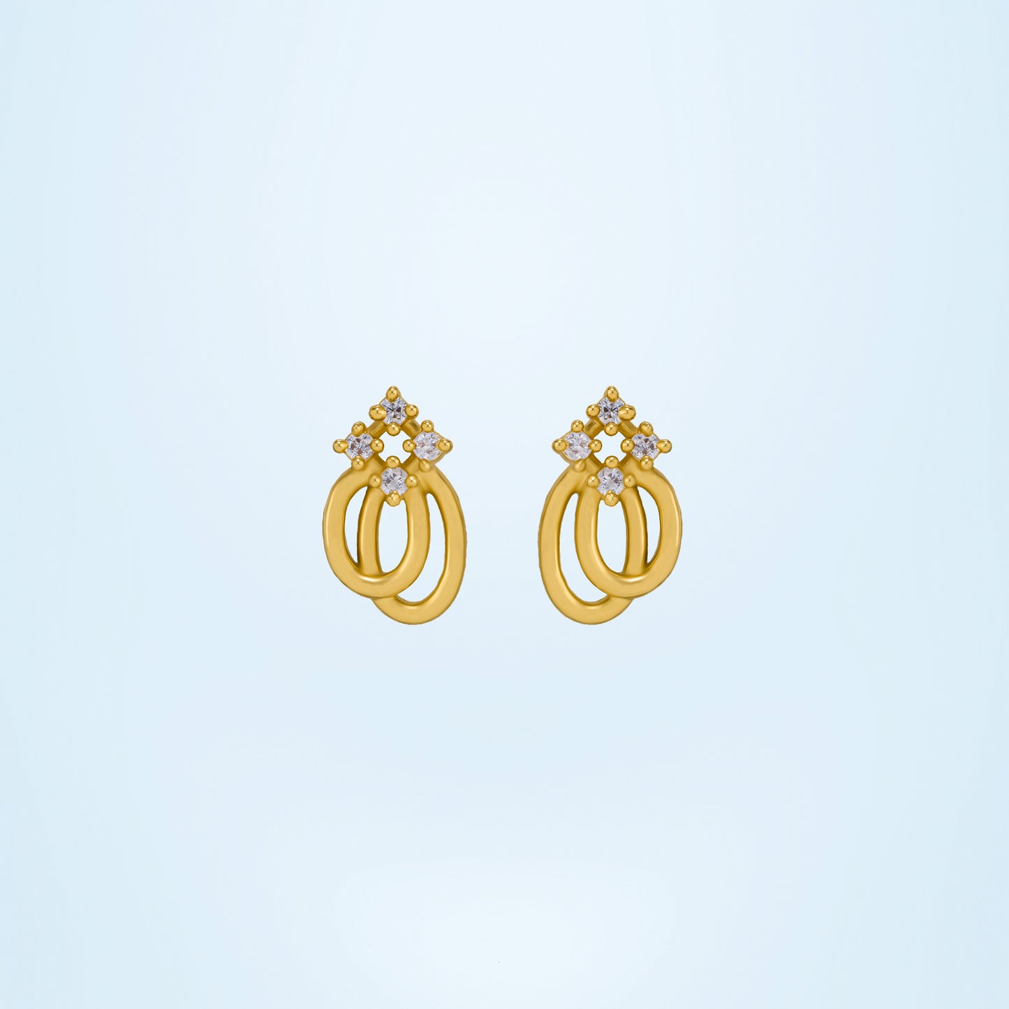 pair of golden earrings with a diamond