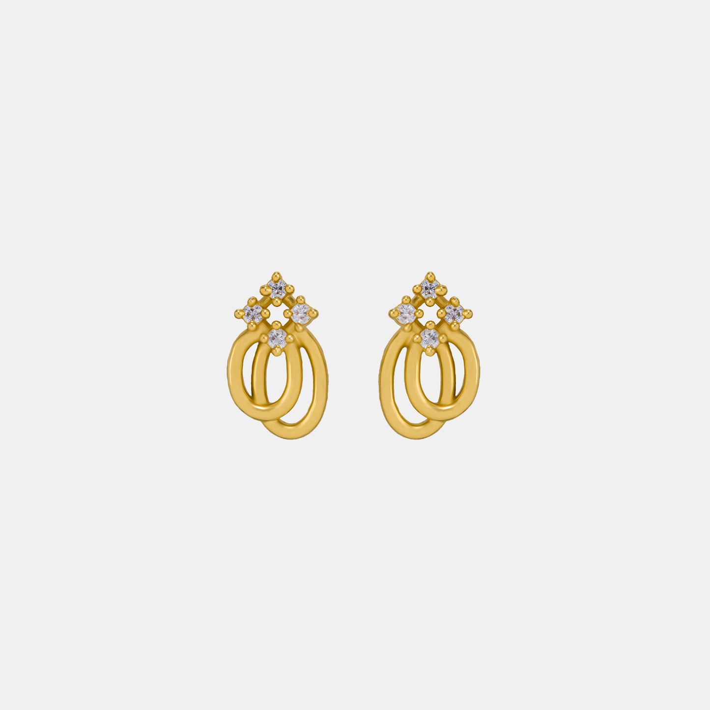 pair of golden earrings with a diamond