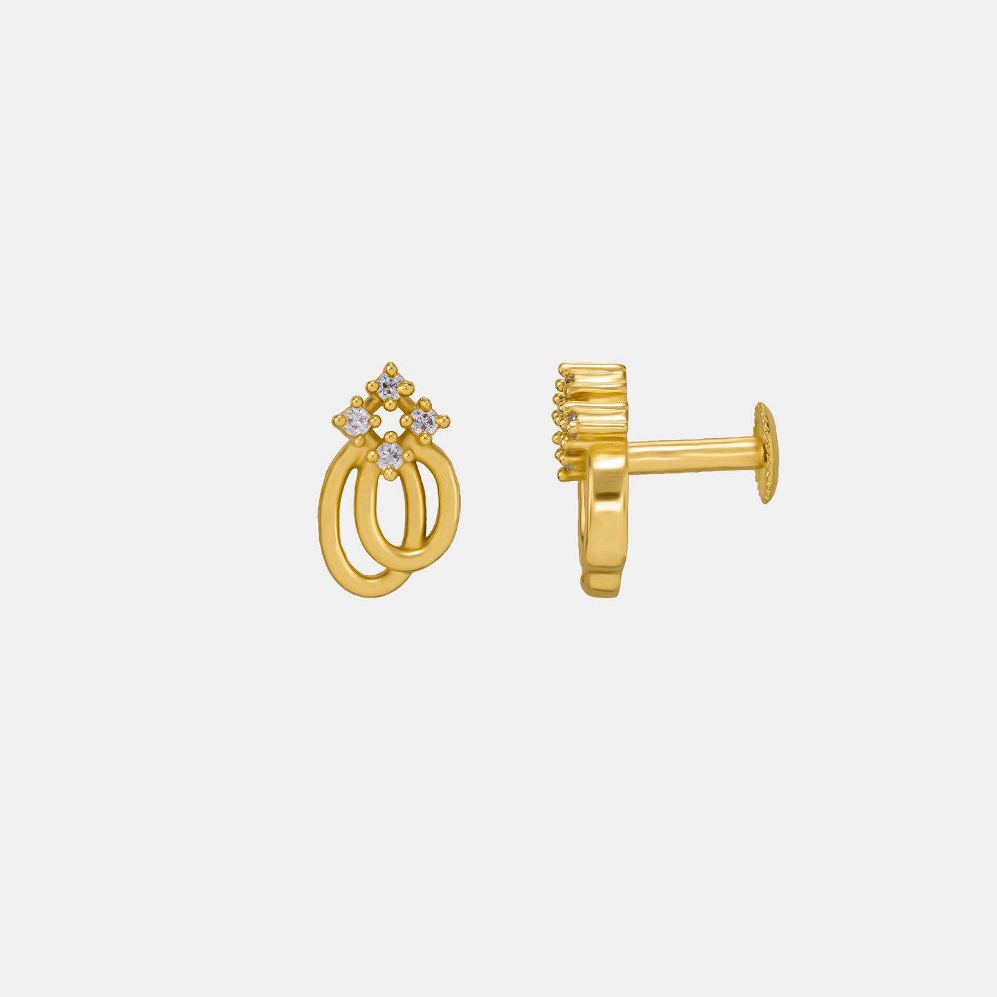 pair of golden earrings with a diamond