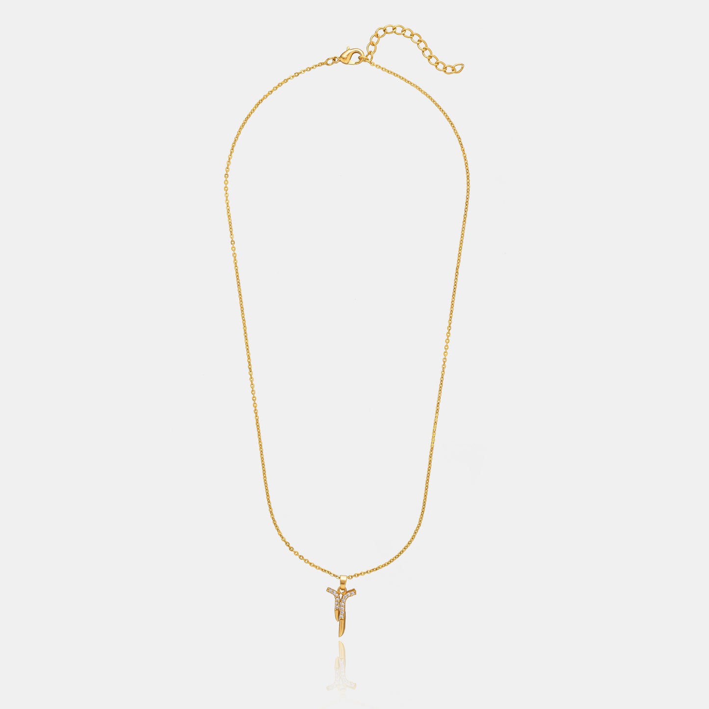 golden necklace with a diamond pendant