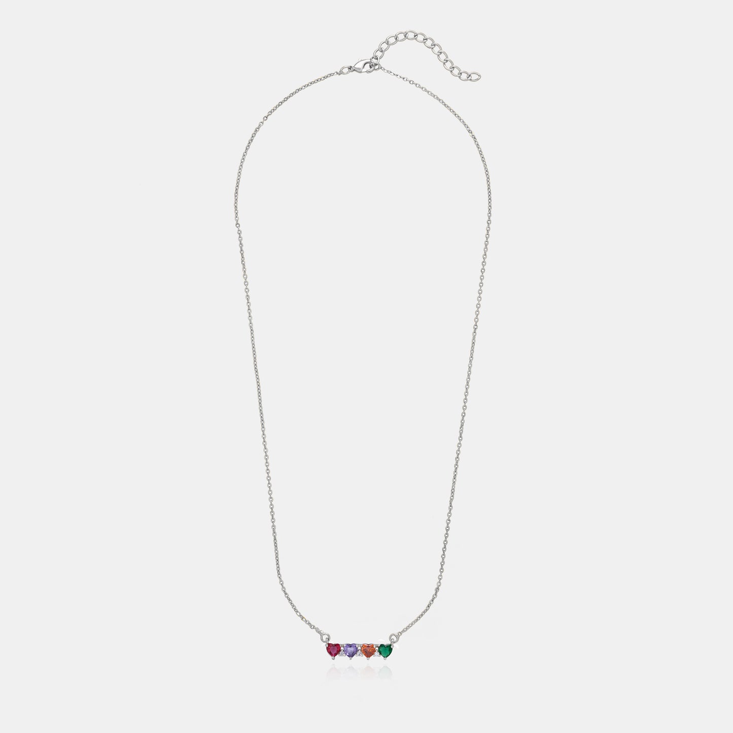 silver necklace with four gems on it