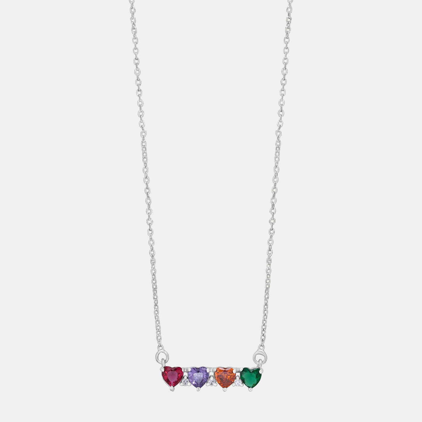 silver necklace with four gems on it