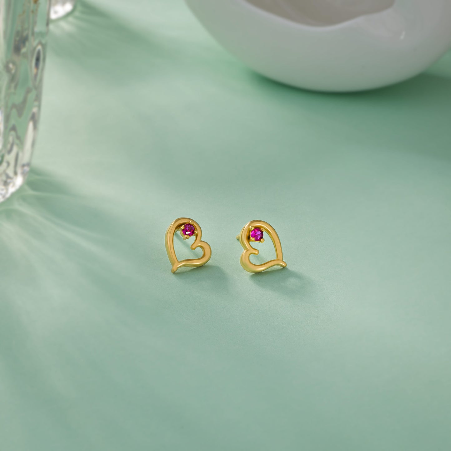 heart’s whisper ruby studs