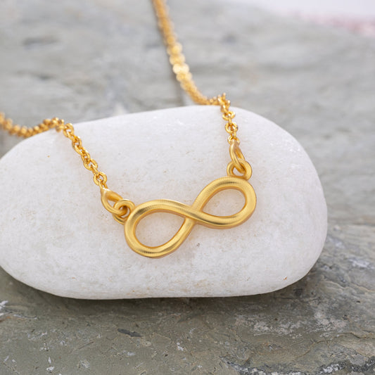 Golden Infinity Necklace with a Diamond