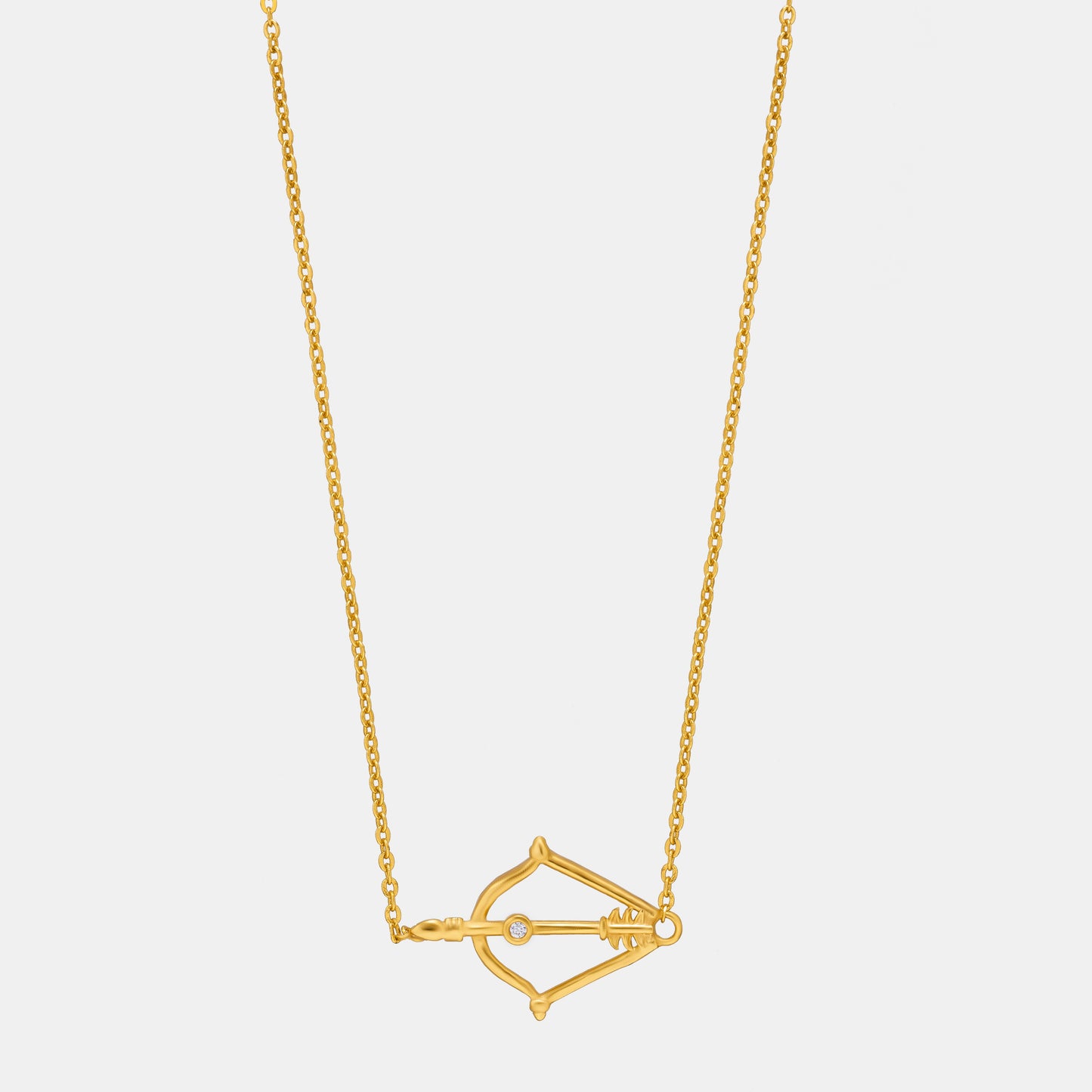 golden necklace with a small arrow on it