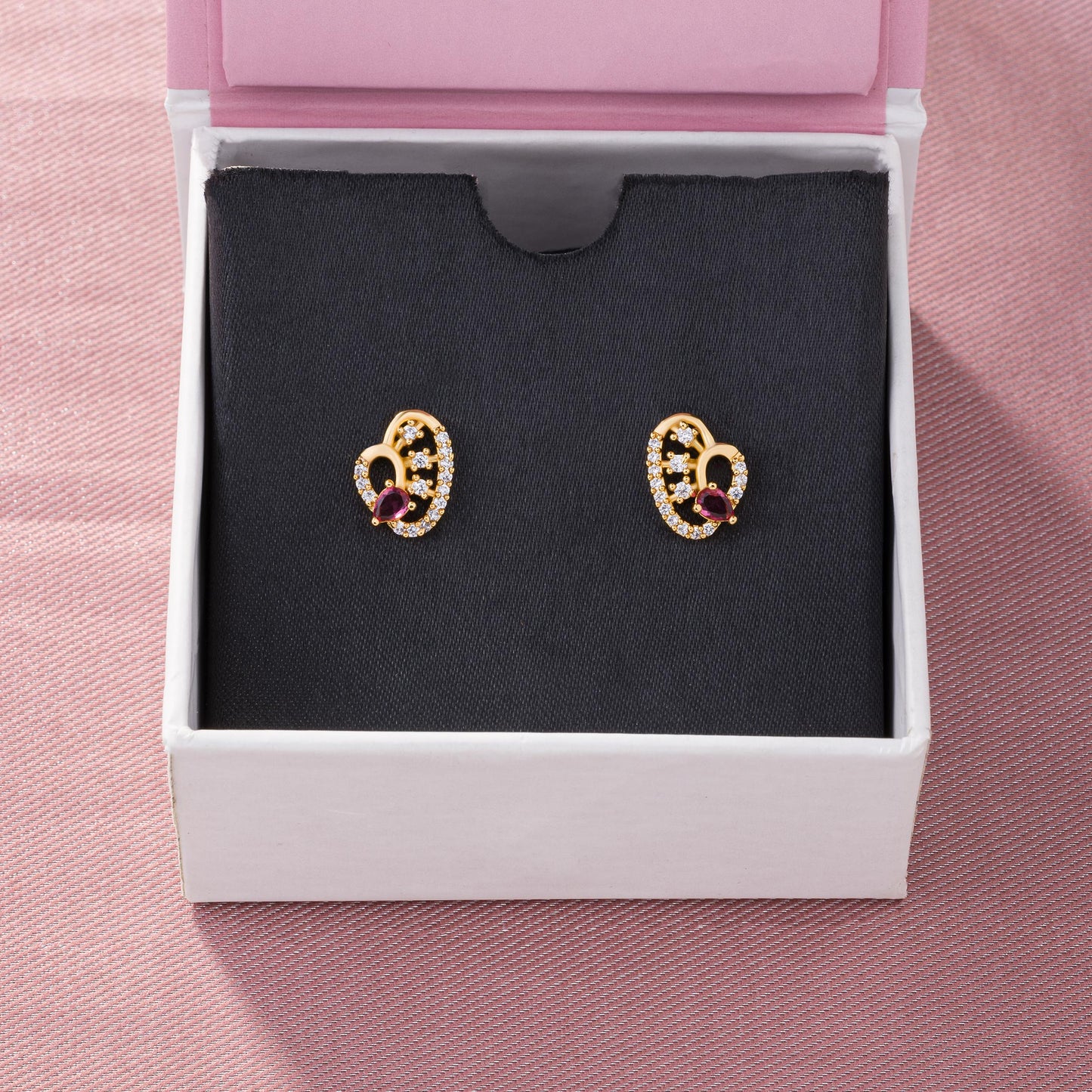 pair of golden earrings with diamonds