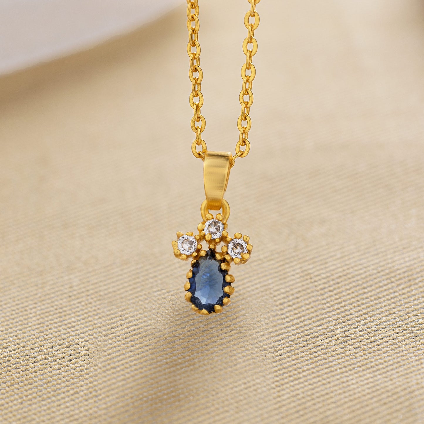 blue emerald teardrop pendant