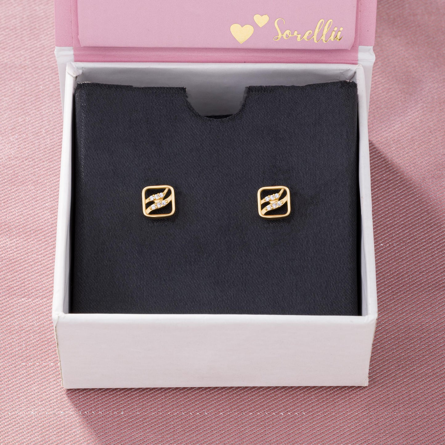 pair of golden earrings with diamonds