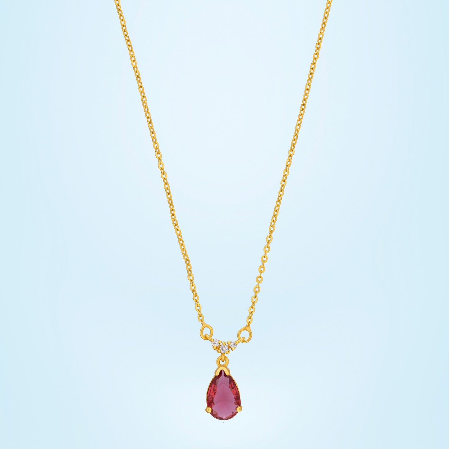 golden necklace with a stone