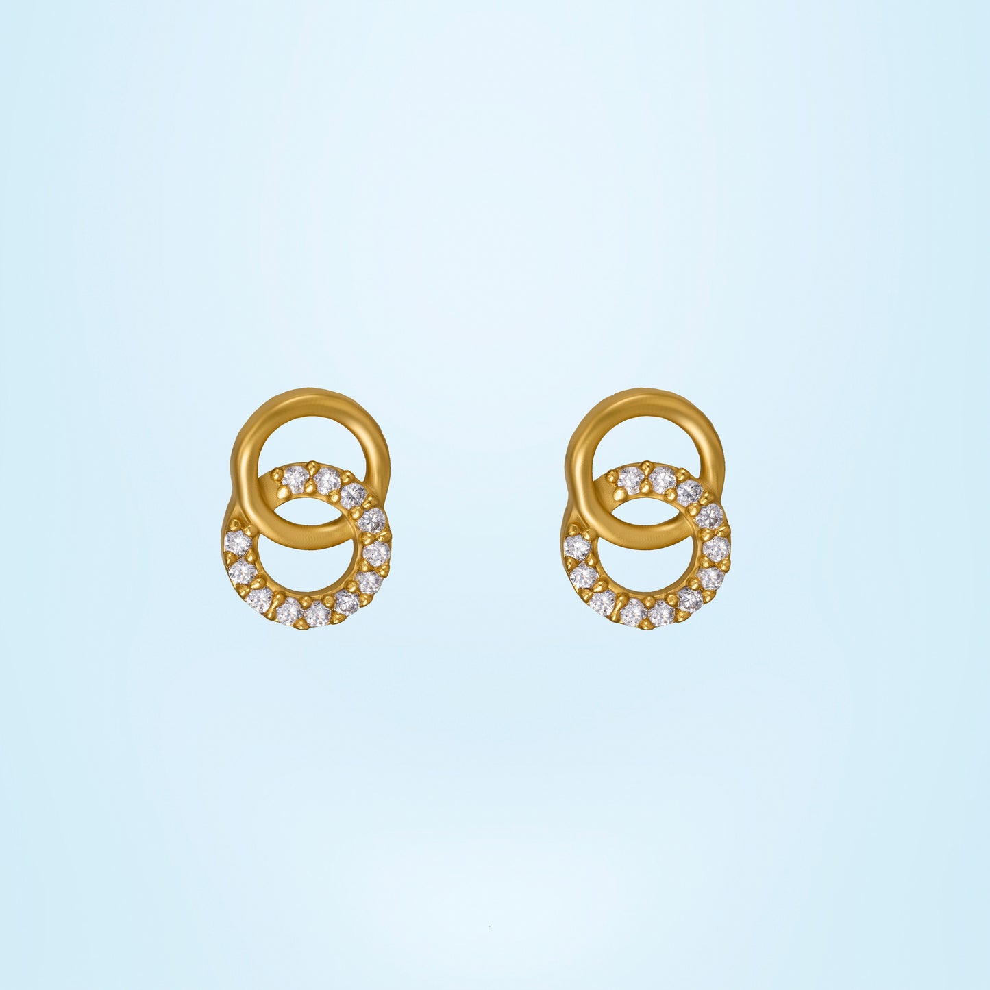 pair of golden earrings with diamonds