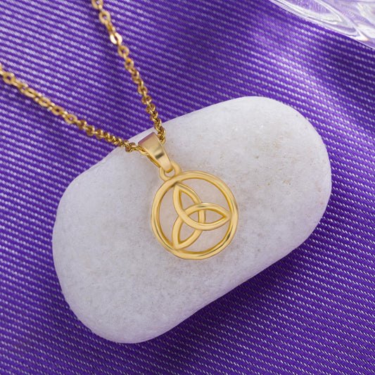 Golden Necklace with a Peace Sign on it