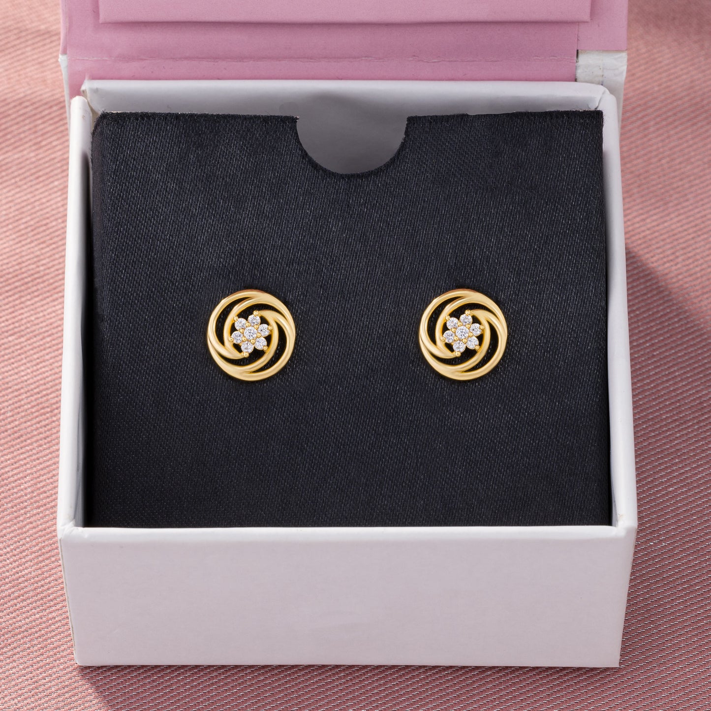 pair of golden earrings with diamonds