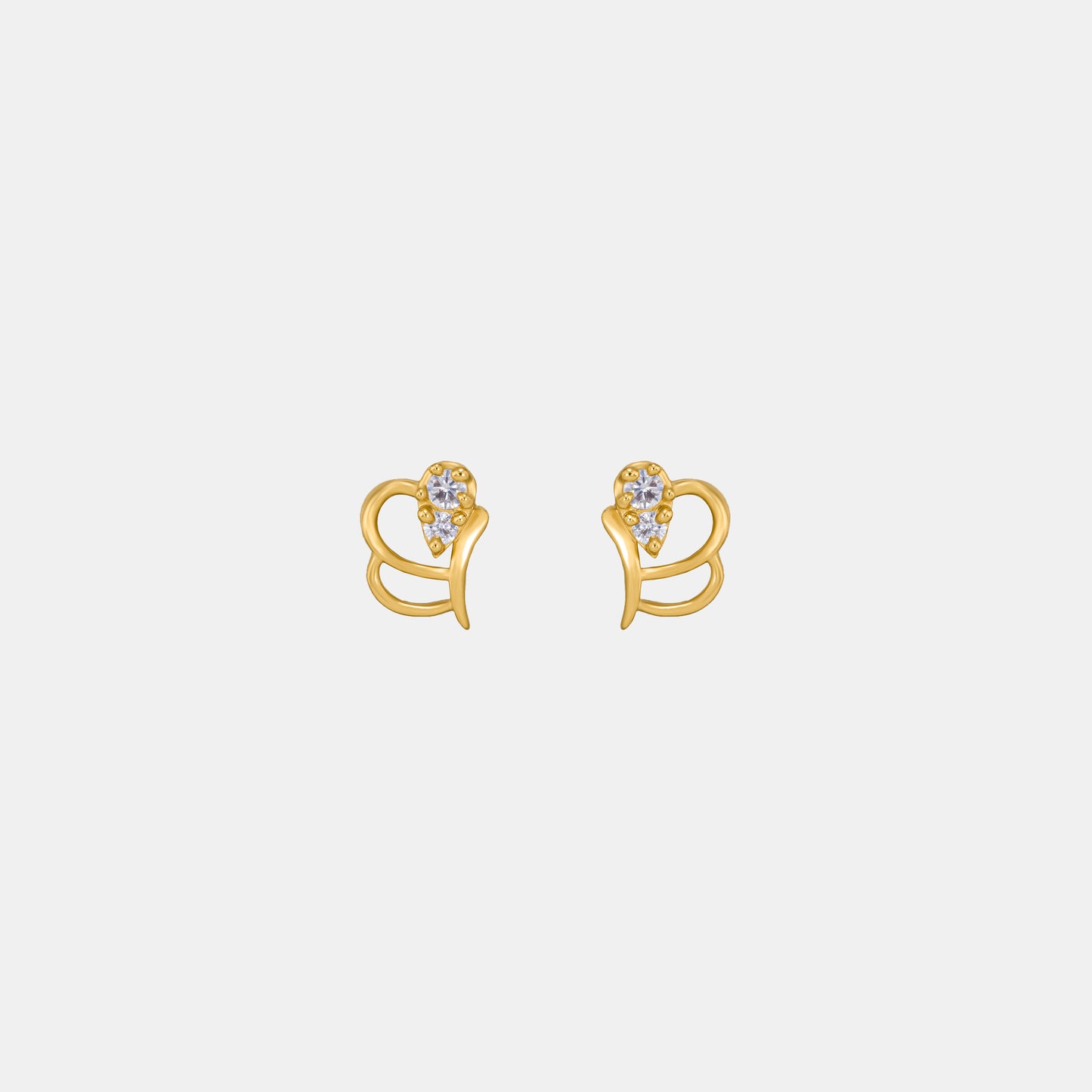 pair of golden earrings with a diamond