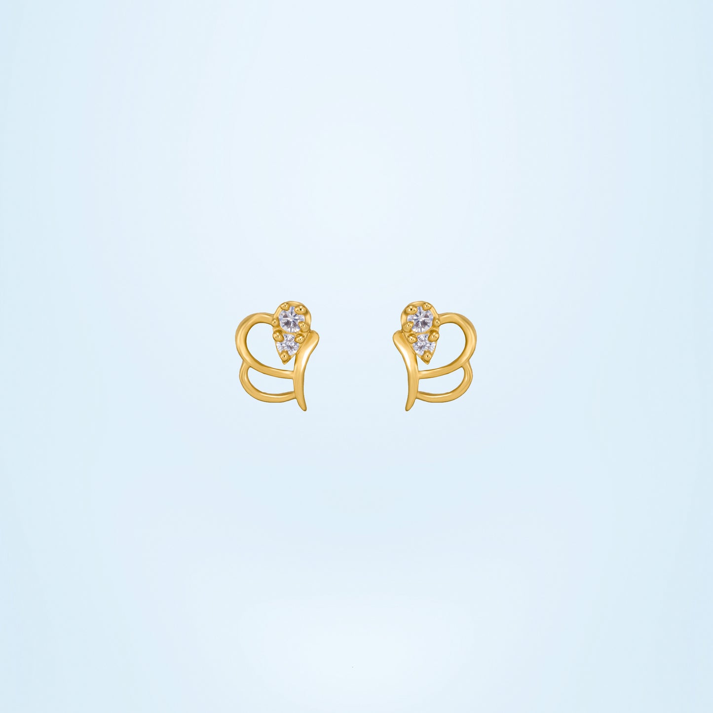 pair of golden earrings with a diamond