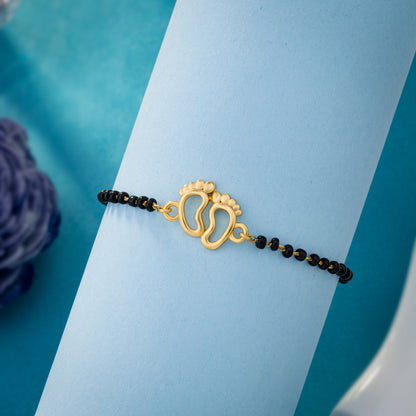 Bracelet with a Golden and Black Bea