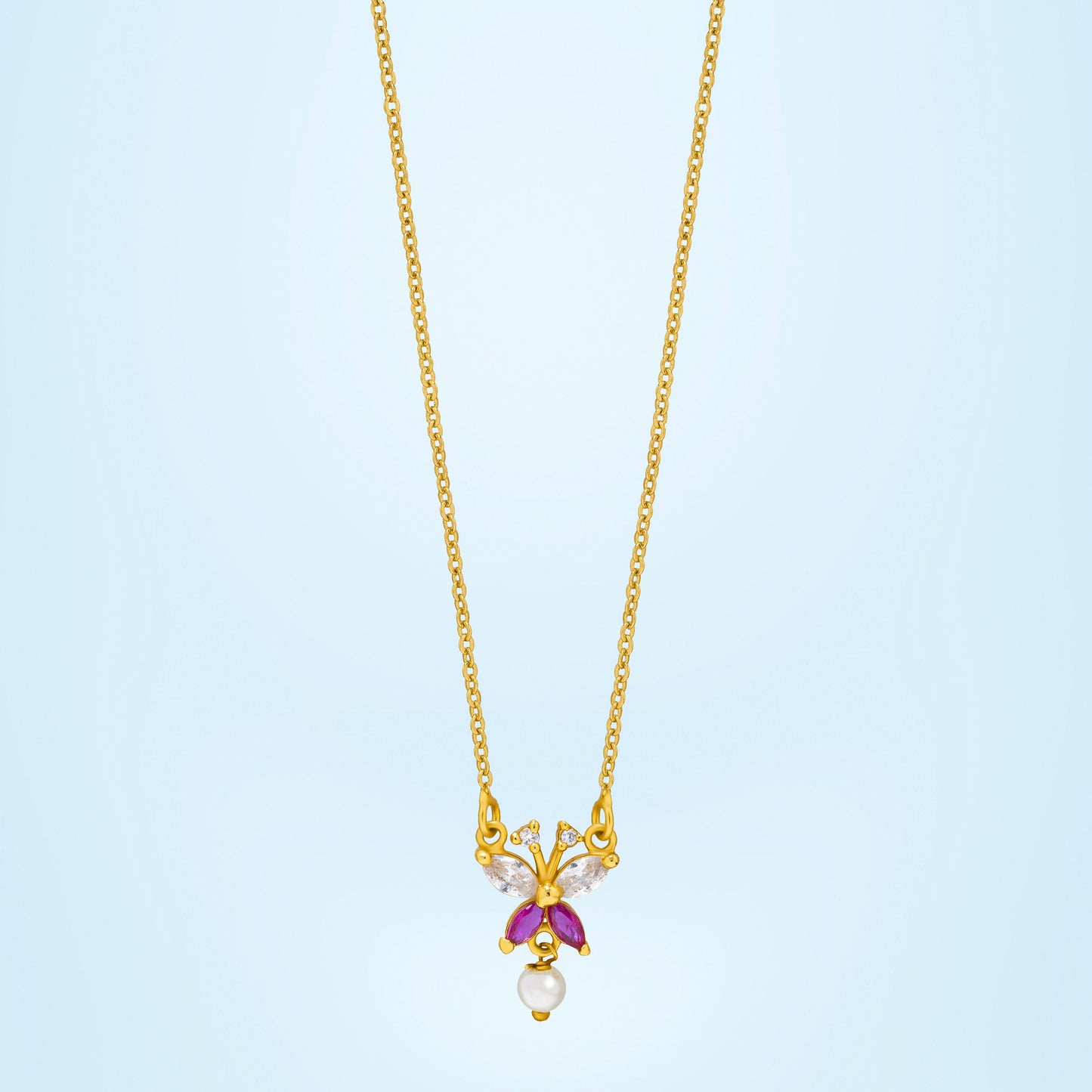 golden necklace with a butterfly pendant