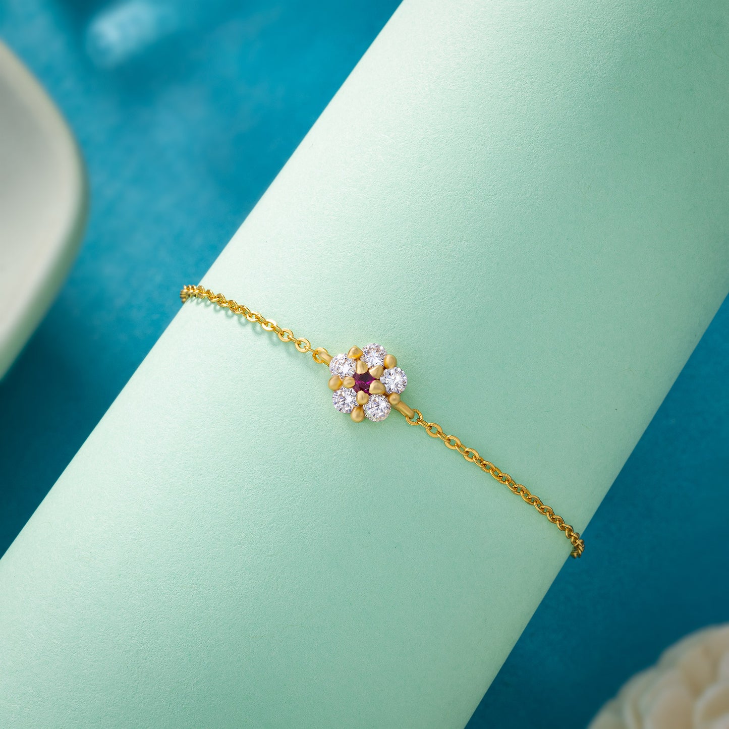 golden floral bracelet with diamond stone petals