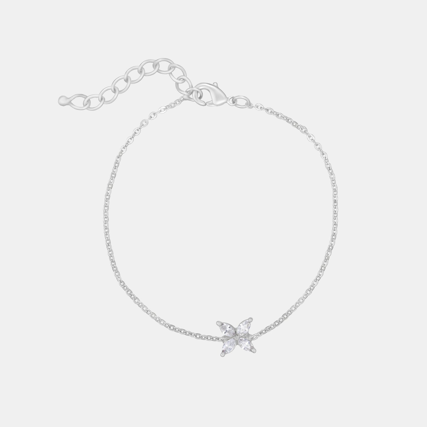 silver bracelet with a small white butterfly