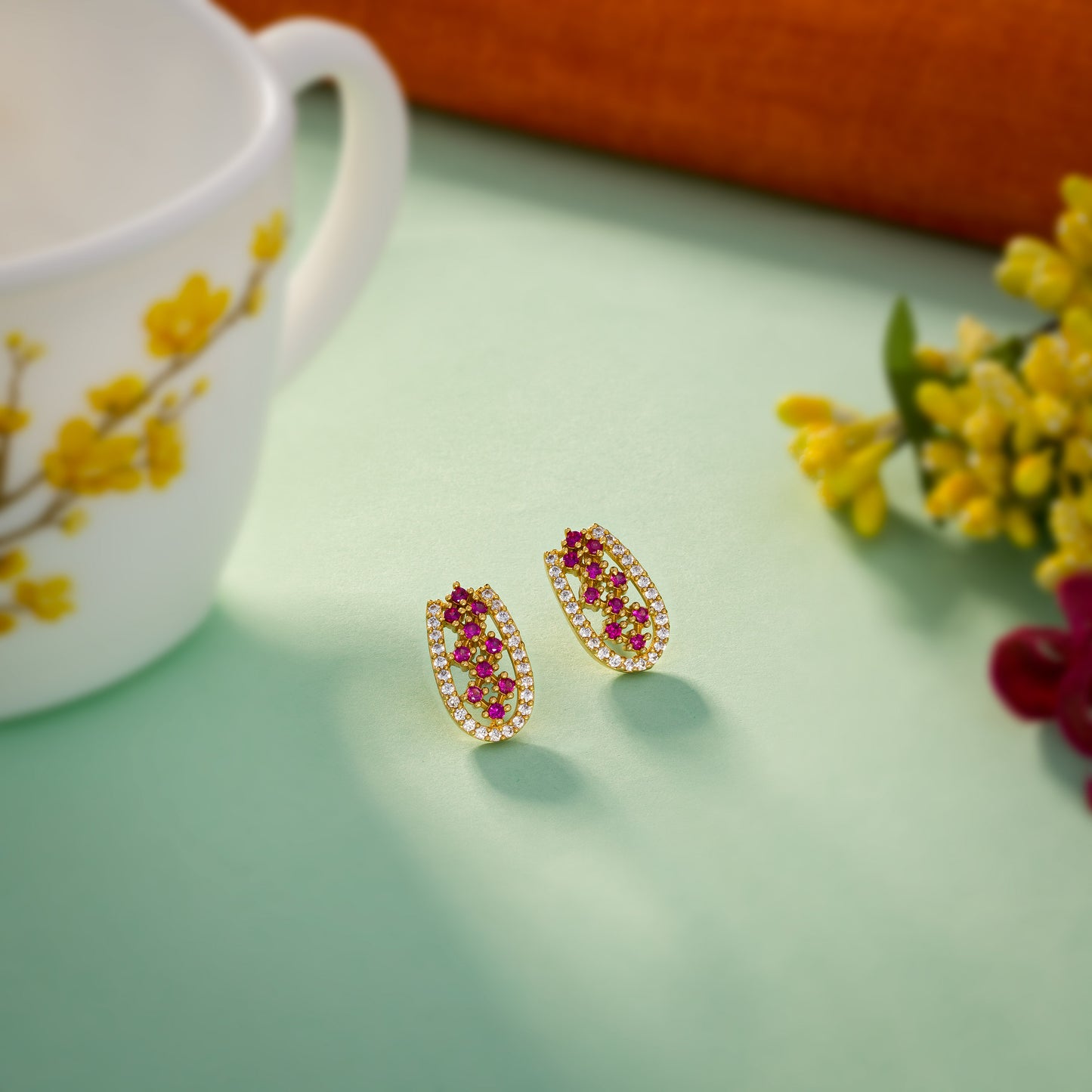 pair of emerald and diamond earrings