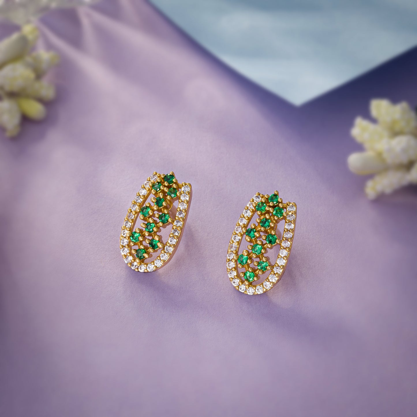 pair of emerald and diamond earrings