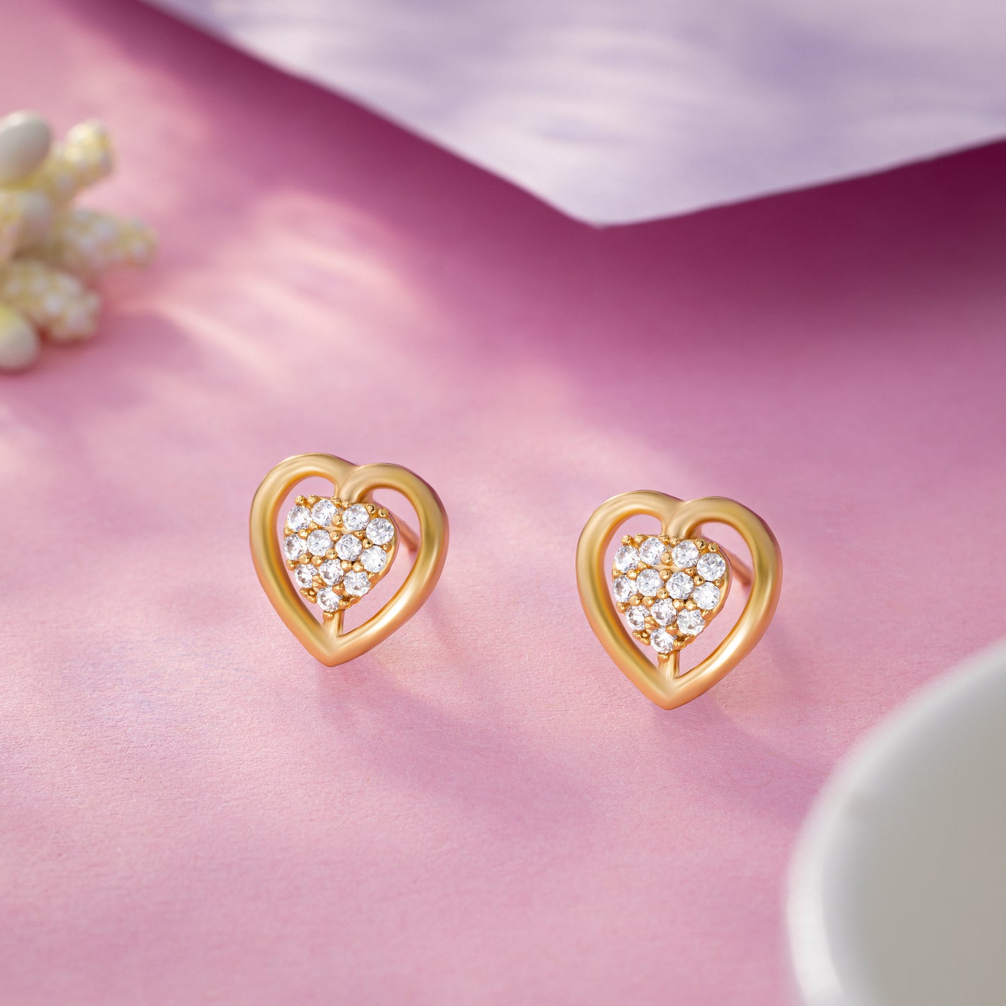 white radiant heart studs