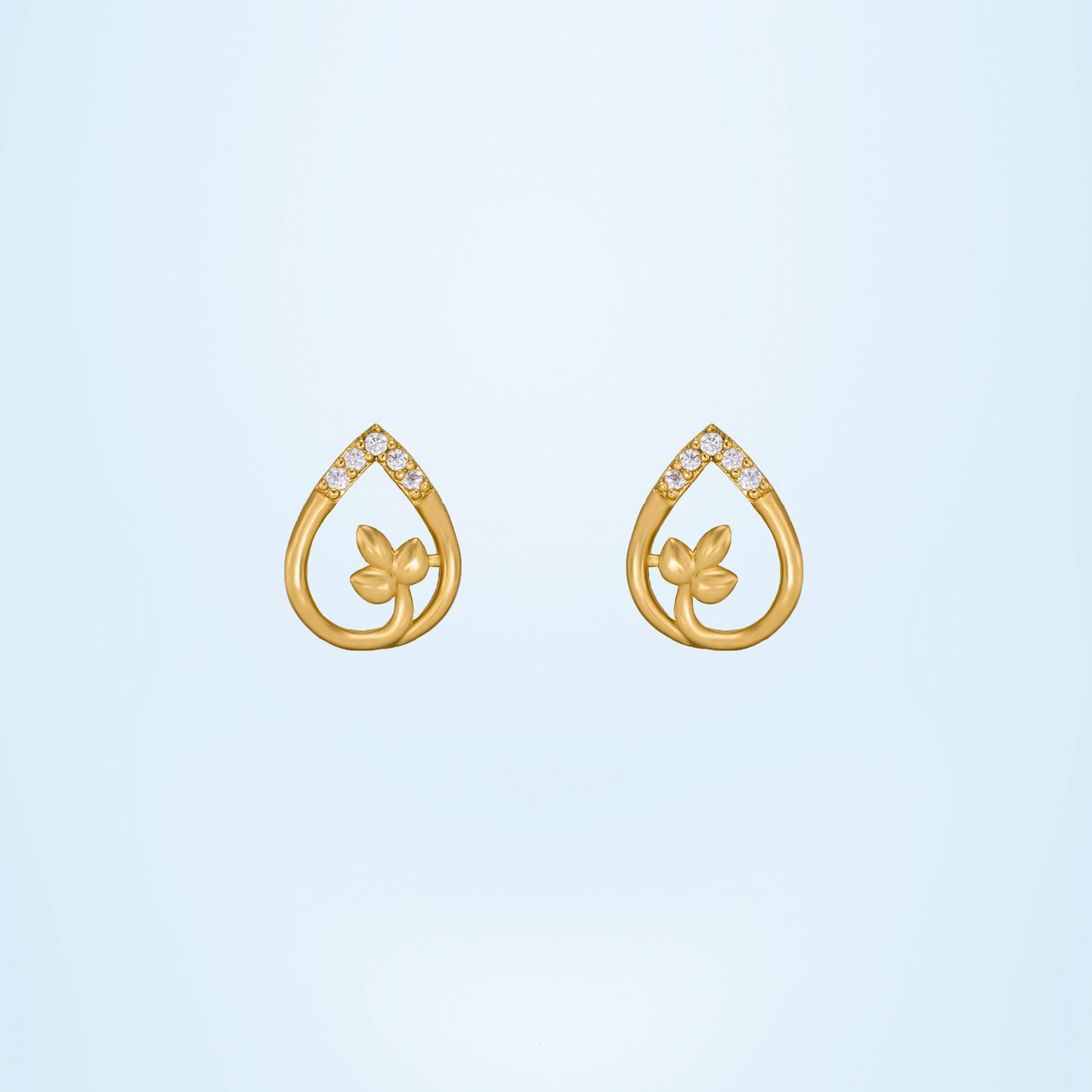 pair of golden earrings with diamonds