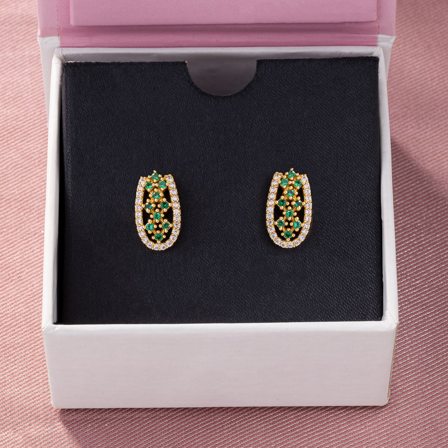 pair of emerald and diamond earrings