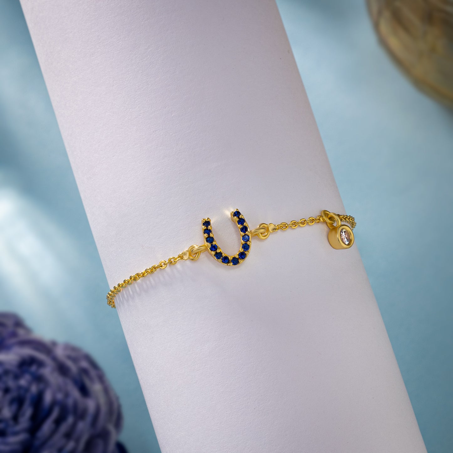 golden bracelet with c cut small diamonds