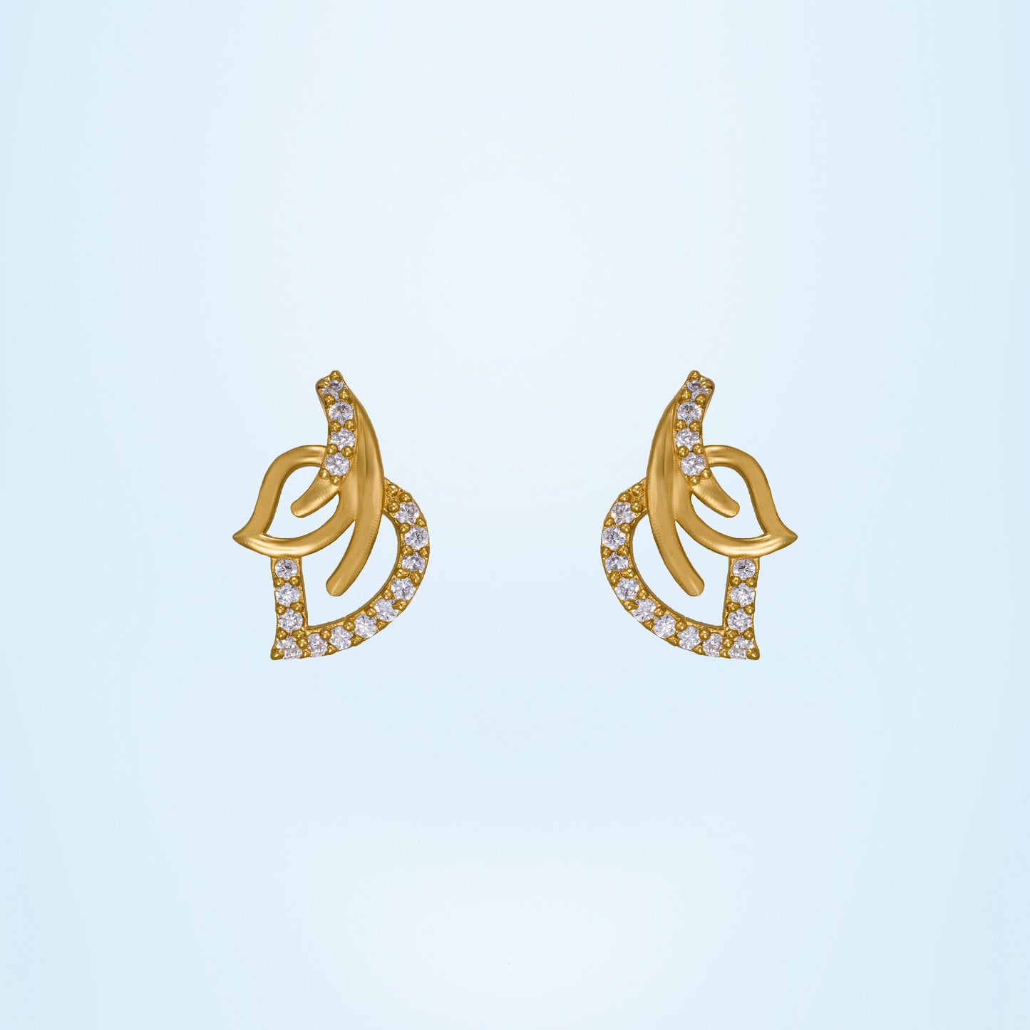 pair of golden earrings with diamonds