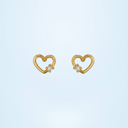 Pair of Golden Earrings with a Heart Shaped Diamond