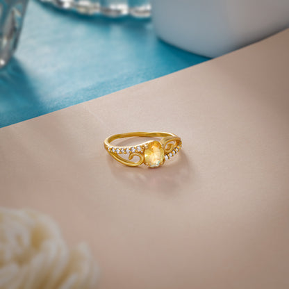 Golden Ring with a Tourmal Stone and Diamonds