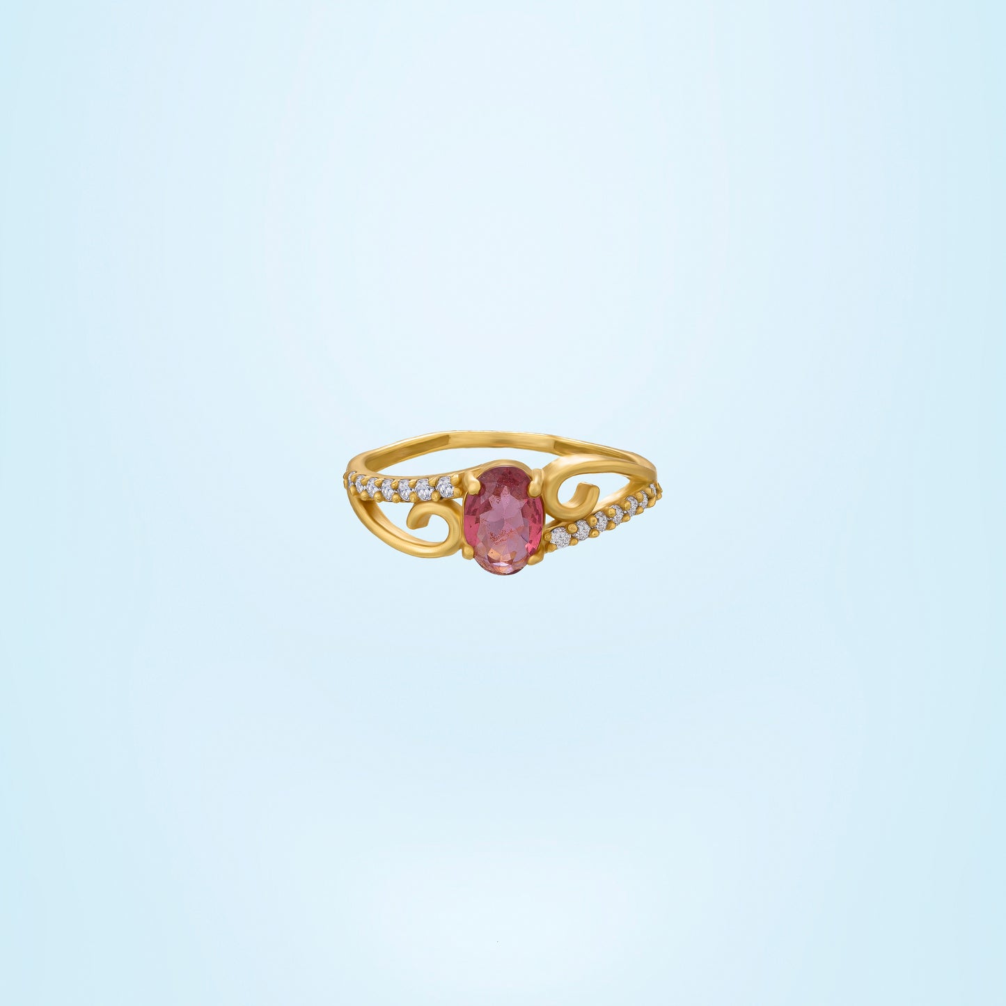 golden ring with a tourmal stone and diamonds