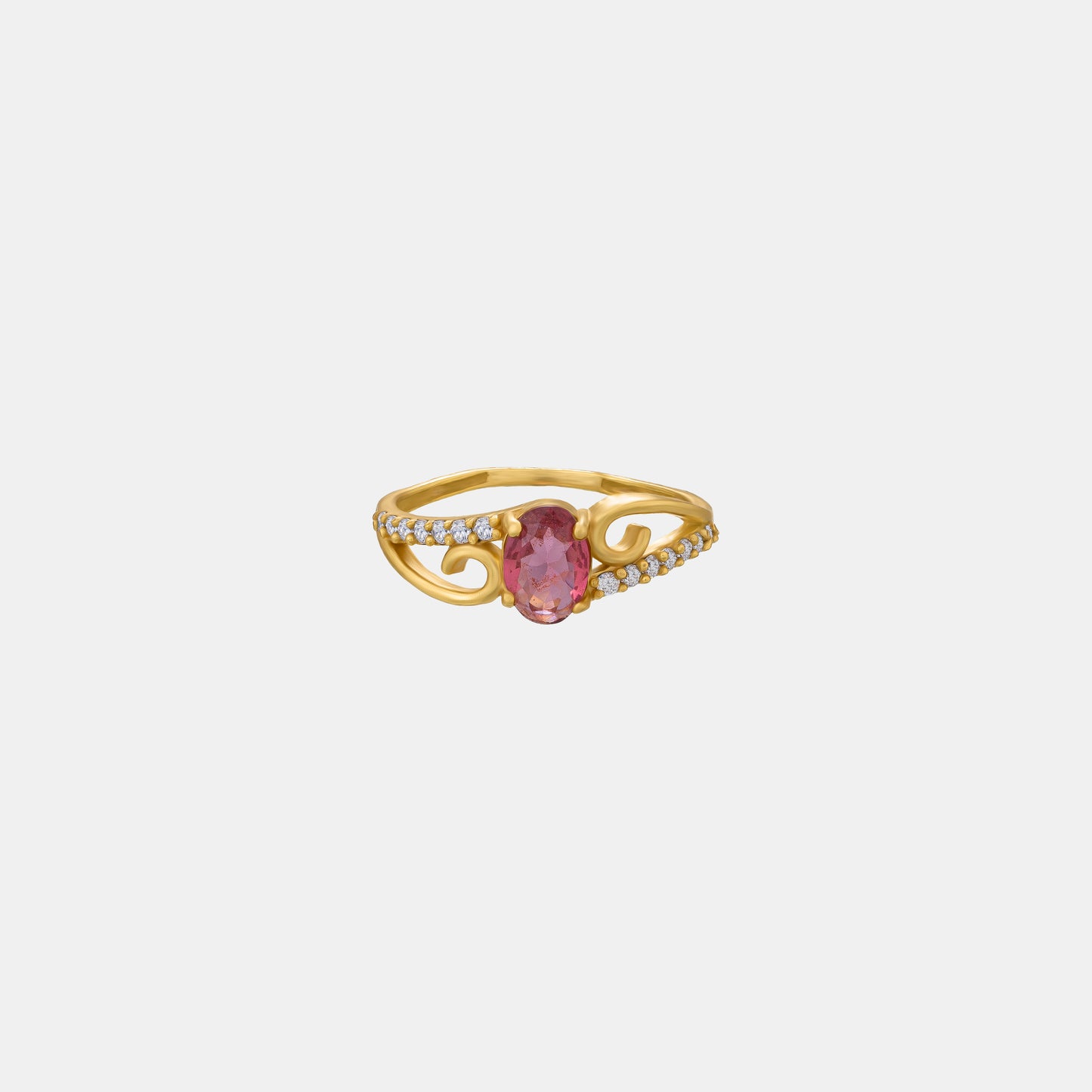 golden ring with a tourmal stone and diamonds