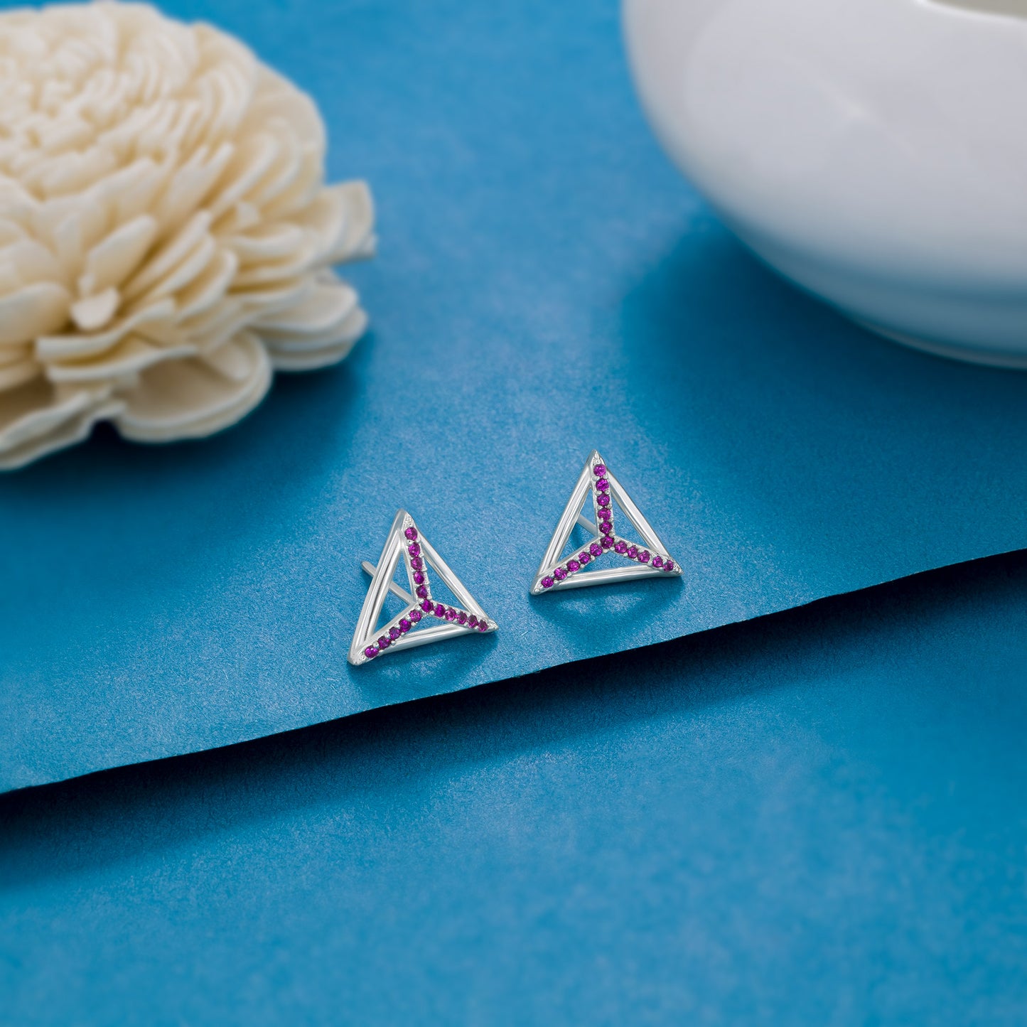 red triad silver studs