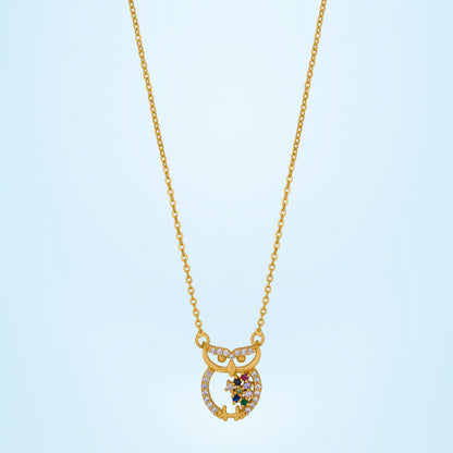 Golden Necklace with a Diamond and Emerald Stone