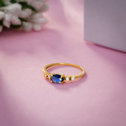 Golden Ring with a Sapphire and Diamonds