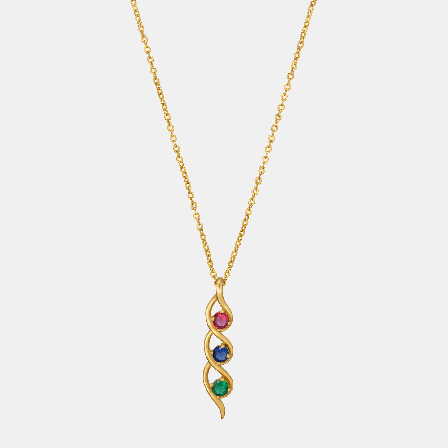 golden necklace with a rainbow stone pendant