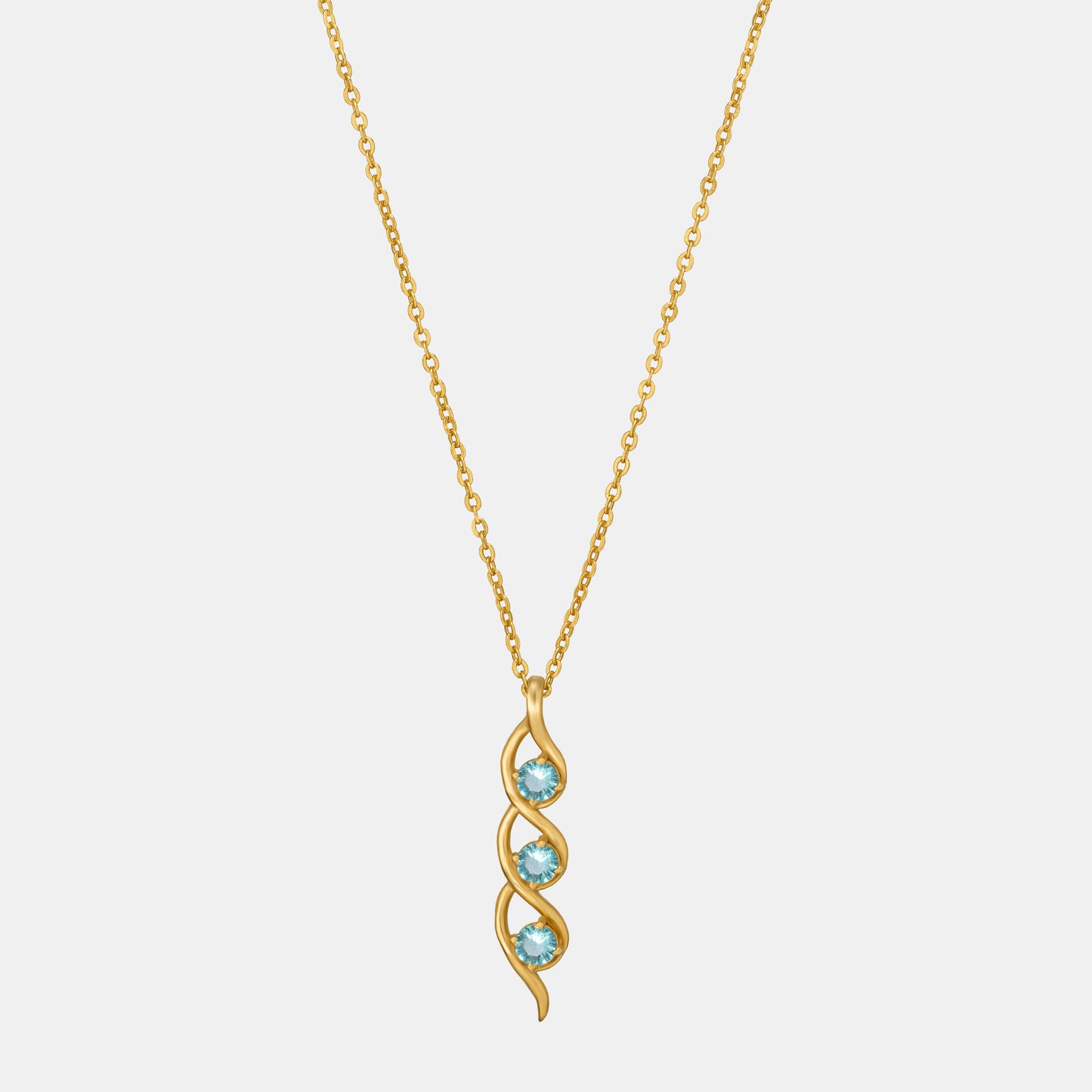 golden necklace with a rainbow stone pendant