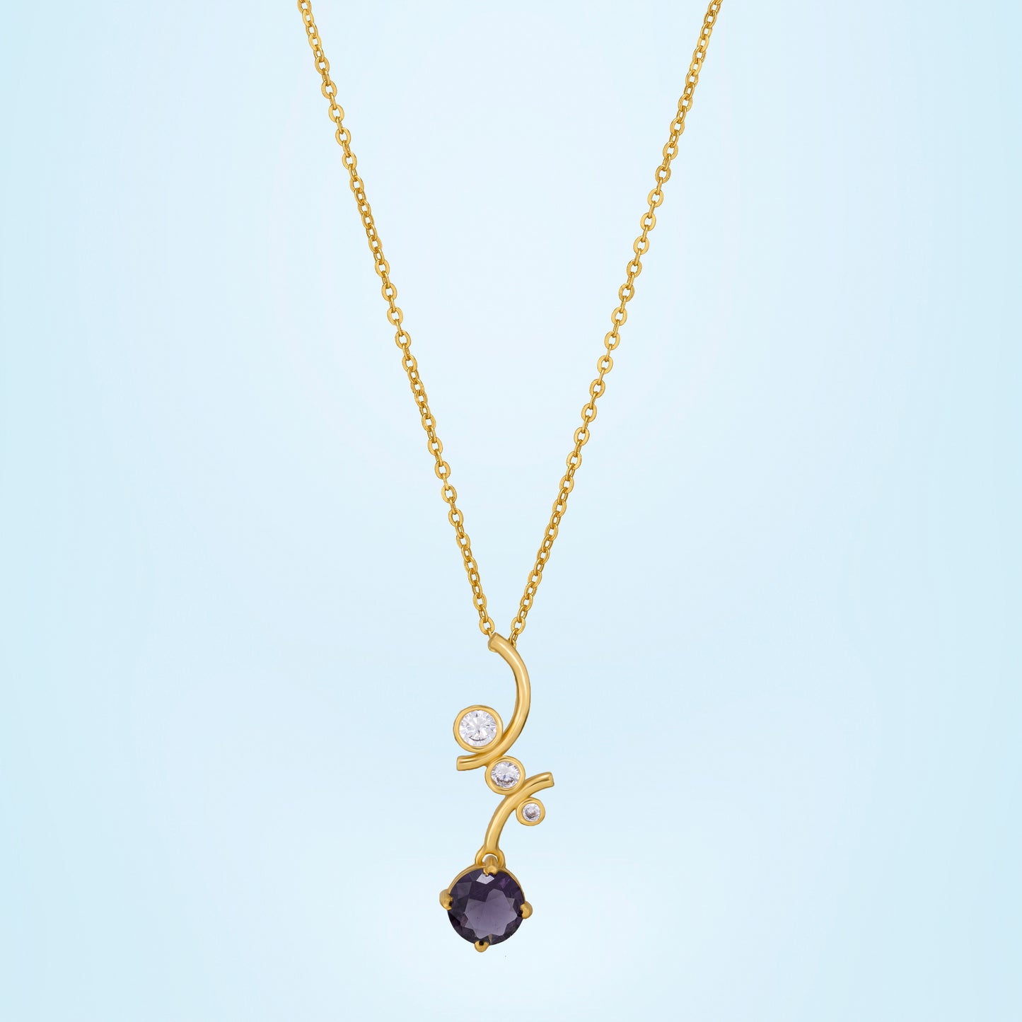 golden necklace with a stone and diamond